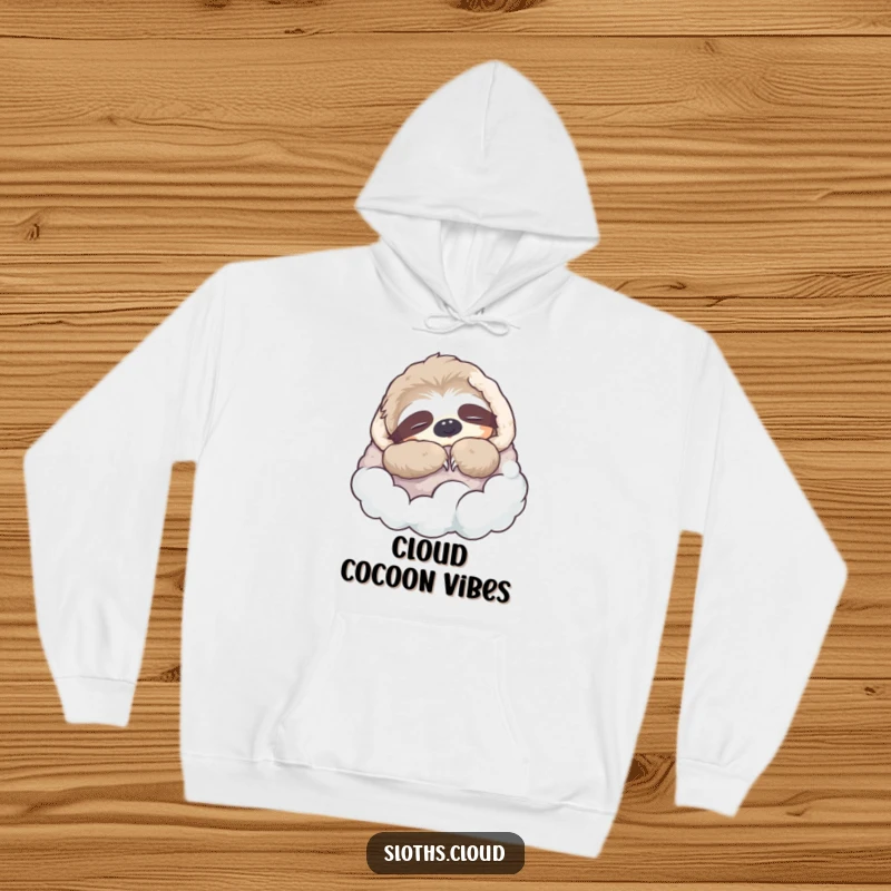 Funny Hoodie: A sloth naps deeply, enveloped in a soft cloud blanket, offering humorous warmth and ultimate cozy relaxation.