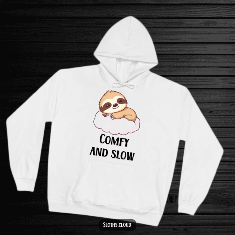 Funny hoodie with a smiling sloth stretching languidly on a fluffy cloud, designed for ultimate comfort and as a humorous gift.