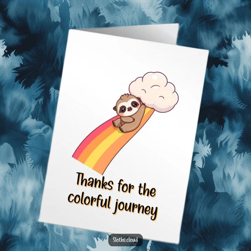 Funny free printable thank you card: Adorable kawaii sloth playfully sliding down a vibrant rainbow from a cloud.