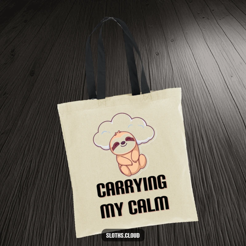 Funny tote bag featuring a sloth dangling from a cloud, perfect for carrying essentials while spreading calm and relaxed vibes.